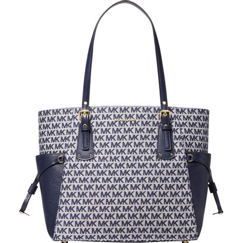 michael kors east west signature tote bag|signature voyager east west tote.